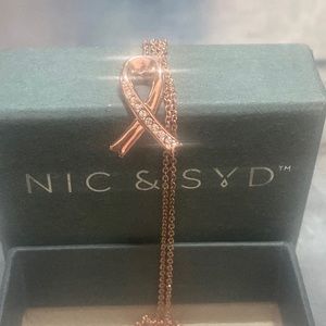 Swarovski crystal Brass Nic & Syd Ribbon pendant. Breast Cancer awareness